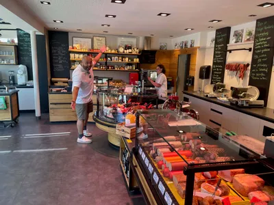 Anthony is amazed at the variety of sausages and meats available in an organic butcher's shop.