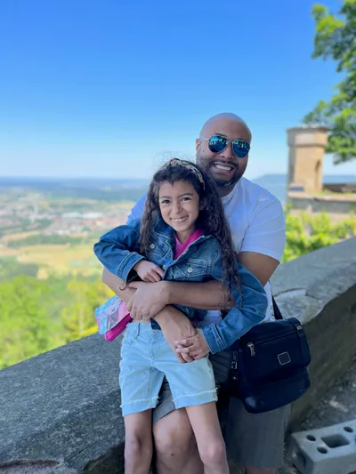 Anthony and his daughter at Hohenzollern Castle.