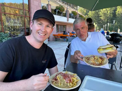 Chris and Manfred enjoying German fast food at lake Mummelsee.