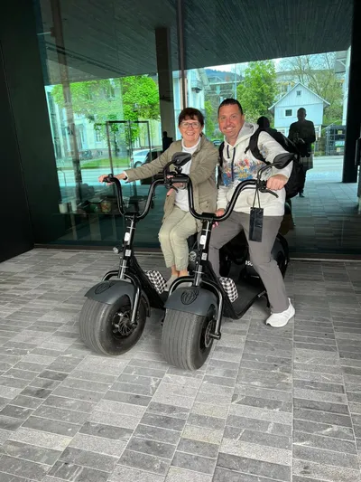 My guests Theresa and Craig posing on cool scooters of the hotel Roomers in Baden-Baden.