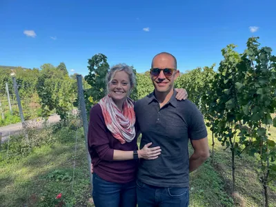 A happy couple from Texas enjoying the vineyard of a family-owned winery in the Palatinate.