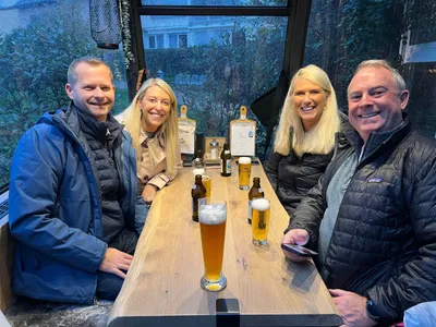 Guests of mine from the US in a repurposed ski gondola in a pub in Neckarsteinach.