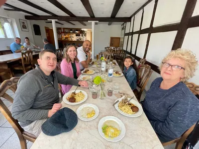Hillary and her family in the tiny restaurant of the organic butcher's shop Grießhaber close to Tübingen.