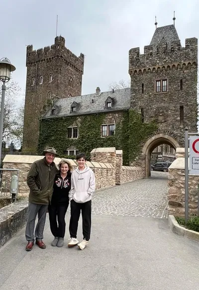 Guests from Georgia in front of a castle that carries their family name.