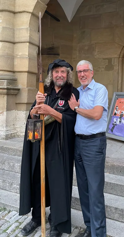 Manfred with George, the Night Watchman star of Rothenburg.