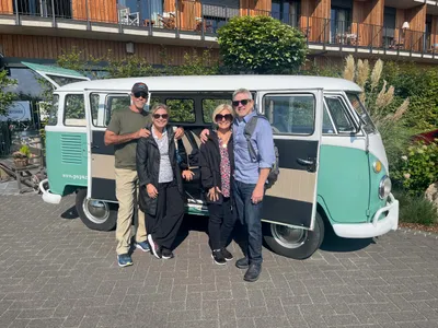 My friends from Texas in front of a Volkswagen Multivan, forefather of my luxury van.