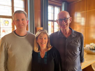 Tony with his wife and son at the place where his parents were married.