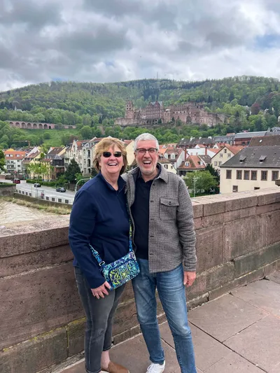 My guest Tracy and I on the Old Bridge in Heidelberg with the Castle in the background.