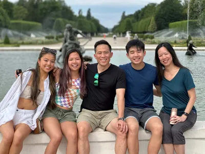 A great shot of my guests, a family from Texas in front of the Fountain of Arion.